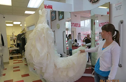 women looking at a new wedding dress